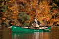 Nova Craft Prospector 14 Tuffstuff Canoe being paddled on a lake