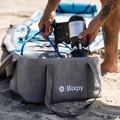 A Bixpy Outboard Motor Kit being packed into the Bixpy travel bag