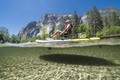 The Hobie Mirage iTrek 9 Ultralight inflatable kayak on a shallow river