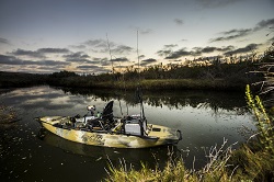 A Camo Pro Angler 14 loaded up with fishing gear