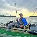 catching fish from a kayak whilst wearing the Palm Kola Angler PFD