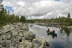 Pelican 15.5 canoe paddling on a river