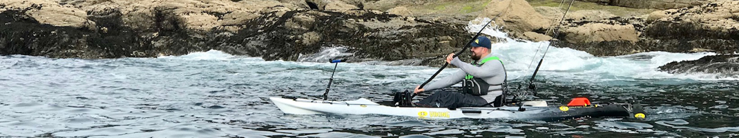 Staff Member Andrew Paddling Viking ProFish Reload Kayak In Cornwall