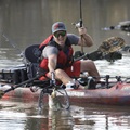 YakAttack Leverage Landing Net being used to catch a fish on a kayak