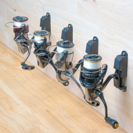 Spinning reels stored in a garage with the BerleyPro Reel Dock