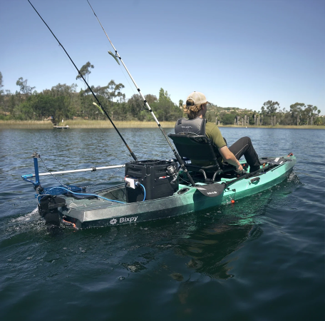 Bixpy K-1 Motor Kit powering a fishing kayak on the water
