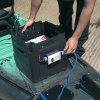 Bixpy K Power Module fitted to a crate on a fishing kayak