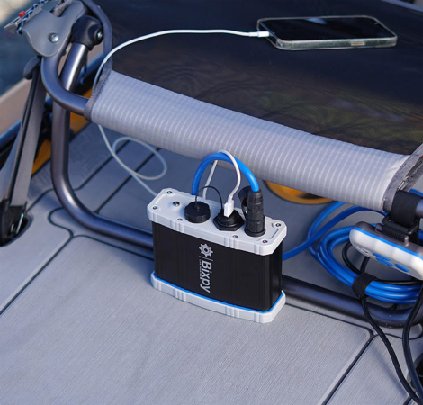 Bixpy 12V USB Outdoor Power Bank charging a mobile phone