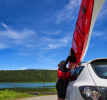 Lifting the lightweight Delta 15s kayak on to a car roof rack