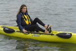 A lady using the Hobie Revolution 11 Kayak