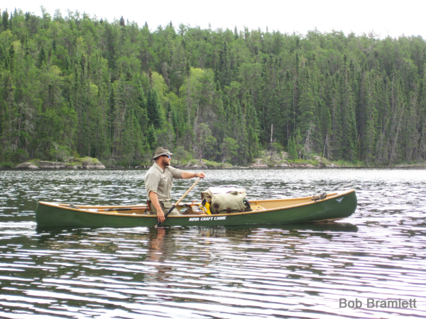 Nova Craft Pal 16 canoe paddling on a lake