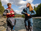 A female paddler wearing the Palm Cascade Womens Dry Suit 