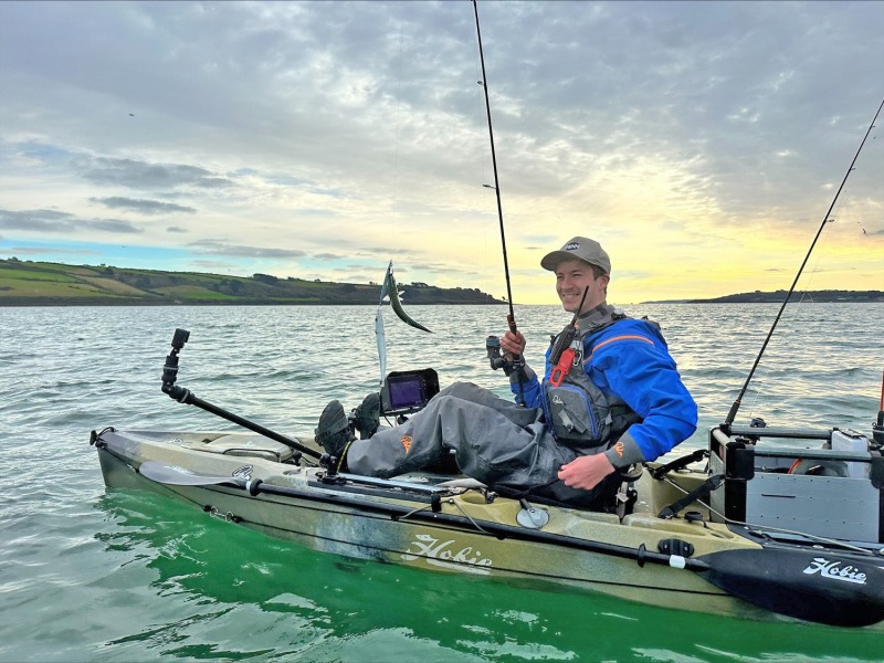 catching fish from a kayak whilst wearing the Palm Kola Angler PFD