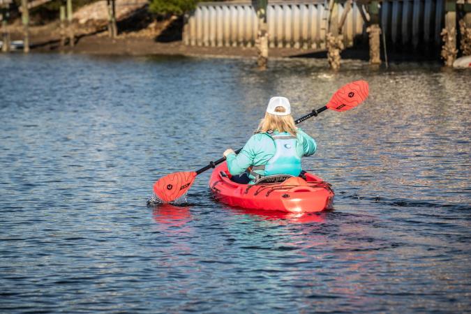 Paddling the Riot Bayside 10 Kayak on calm water