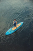 Paddler using the Spinera Let's Paddle 10ft 10in SUP 