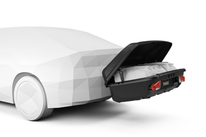 Thule Arcos M Box carrying luggage on the back of a car