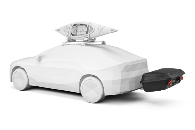Thule Arcos Large Cargo Box at the back of a car with a kayak on it's roof racks