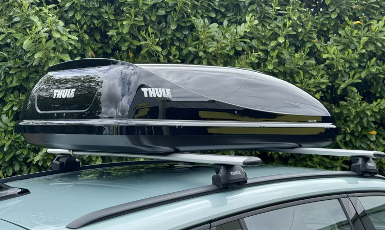 The Thule Ocean 200 Roof Box fitted to roof bars on a car