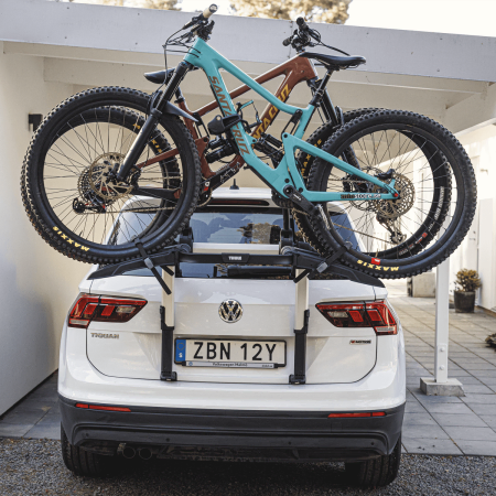 Thule Outway Platform bike rack fitted to the back of a car with bikes loaded