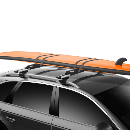 Thule Surf Roof Rack Pads being used to carry a surf board on a roof rack