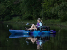 The Vibe Makana 100 Kayak on a calm lake