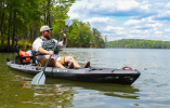 An angler fishing from the Vibe Sea Ghost 130 kayak