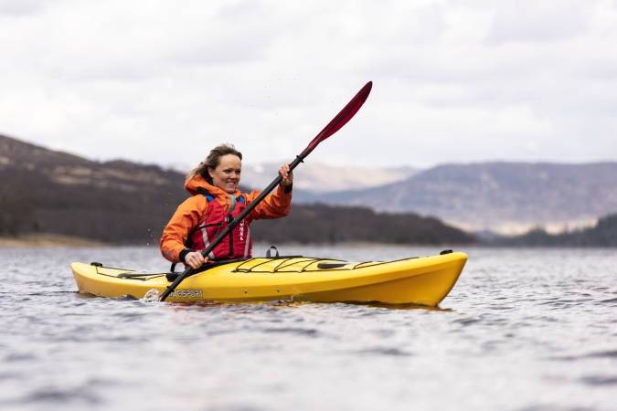 Paddling on a lake using the Wavesport Hydra 145 kayak