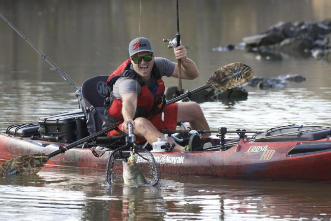 Landing a fish with the Yak Attack Leverage Landing Net