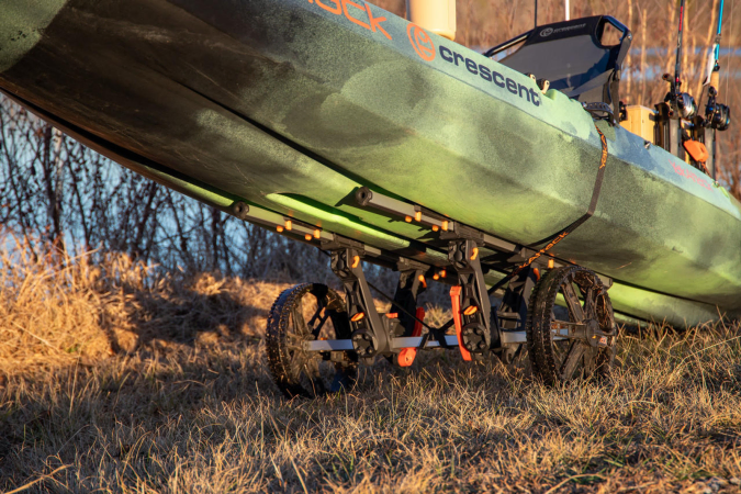 Yak Attack TowNStow BarCart in use on a fishing kayak
