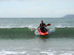 Perception Scooter Sit-On-Top Kayak Riding a Wave