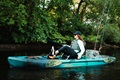 Pedalling the Old Town Sportsman 120 PDL kayak on a lake to go fishing