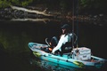 Cruising on the Old Town Sportsman 120 PDL kayak on a lake