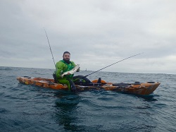 Andrew from Cornwall Canoes with a nice Pollack on the new 2017 Trident 13