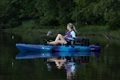 The Vibe Makana 100 Kayak on a calm lake