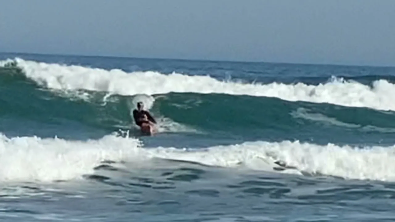 Kayak surfing with the Awesome by Design Kayaks